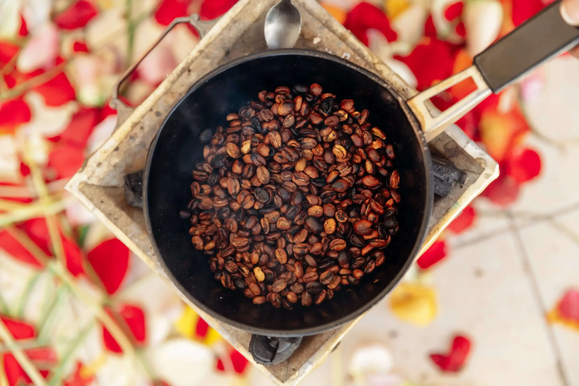 coffee beans roasting in pan