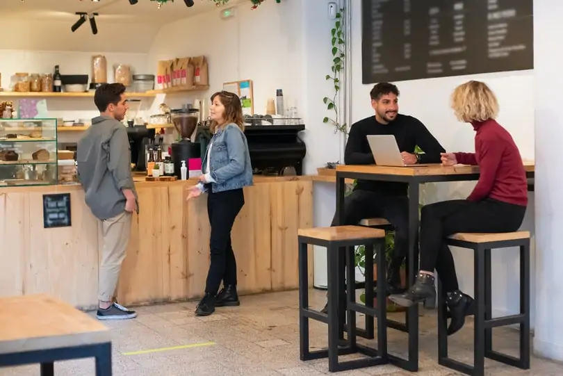 people-having-conversation-in-a-coffee-shop